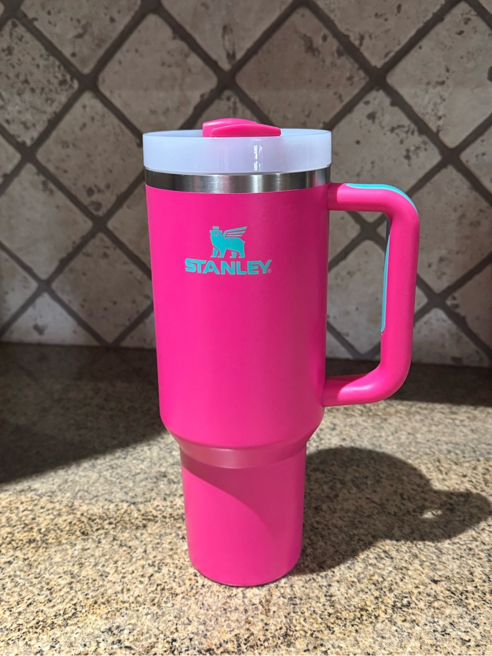 Stanley Hot Pink Travel Mug with Handle and Aqua Logo
